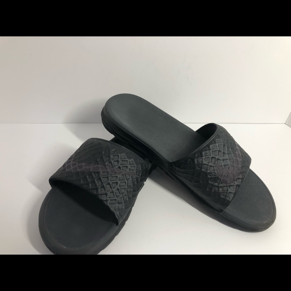 Nike slides. Size 9.  Black Solar soft